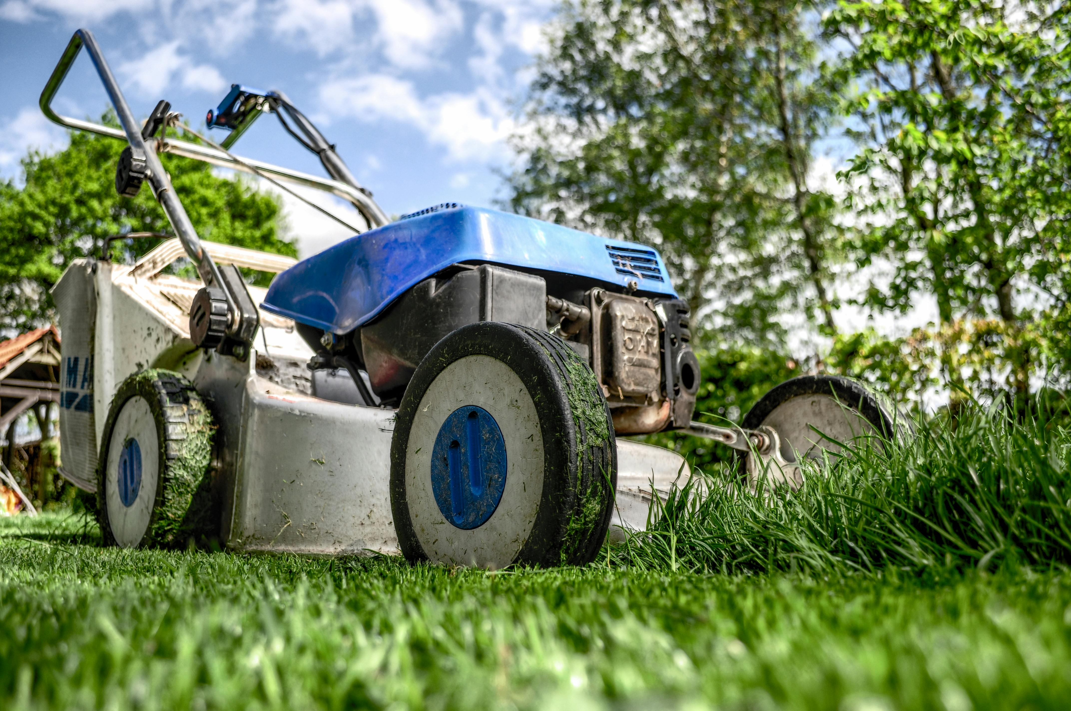 Landscaper mowing